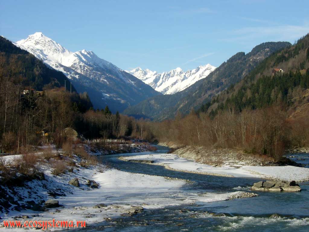 Isel river valley, flowing from the southern slope of the Hohe Tauern mountain range. Far right - Mount Grossglockner  the highest mountain in Austria and Eastern Alps (altitude 3798 m), on the left  Mount Grossvenediger, height is 3674 m. Neighborhood of the village Ainet, Hohe Tauern National Park, Carinthia, southern Austria