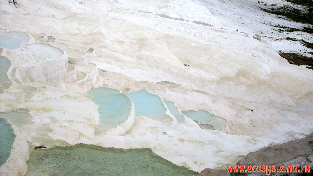 Terraces and baths of travertine  a sedimentary limestone rock formed from calcium carbonates, precipitated from carbonate hot spring waters. Pamukkale